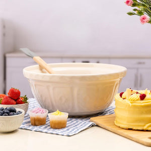 Mason Cash Cream Colour Mixing Bowl on a table with cakes and berries