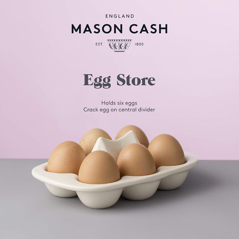 Mason Cash Innovative Kitchen Egg Store holding 6 eggs with a pink background