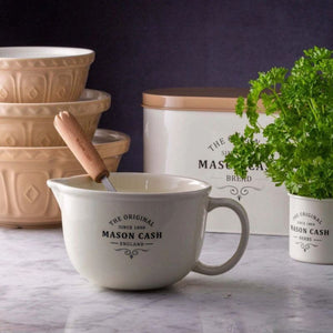 Mason Cash kitchenware including a large white batter bowl, stacked mixing bowls, and the Heritage Bread Bin in the background.