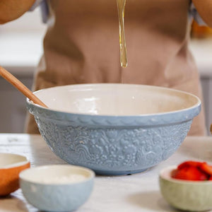 Mason Cash Home To Roost Hen Mixing Bowl in Blue (26cm) shown styled next to the matching prep bowls.