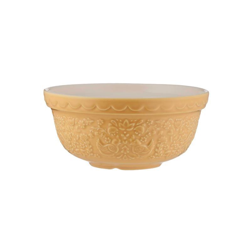 A round ceramic bowl with a warm yellow-gold finish, featuring embossed floral and hen patterns on the exterior and a smooth, slightly lighter interior, set against a plain white background.