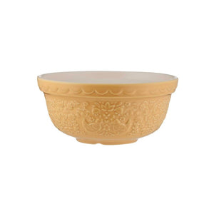A round ceramic bowl with a warm yellow-gold finish, featuring embossed floral and hen patterns on the exterior and a smooth, slightly lighter interior, set against a plain white background.