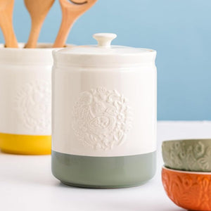 Mason Cash Home To Roost Storage Jar in green 19 cm shown close up to display the embossed details.