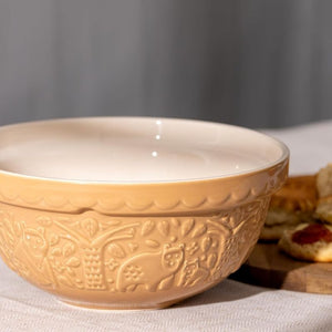Mason Cash In The Forest Bear Mixing Bowl in Cane colour on a light surface.