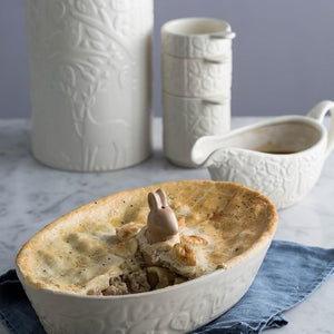 Mason Cash In The Forest Gravy Boat styled next to a pie and other Mason Cash ceramics.