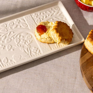 Mason Cash In The Forest Serving Platter styled with buttered biscuits with jam.