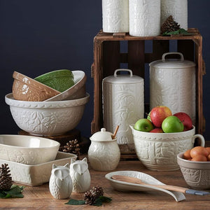 Mason Cash In the Forest Spoon Rest in Cream shown styled next to coordinating in the forest ceramics.