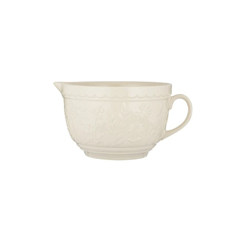 Mason Cash In the Meadow batter bowl in cream, side view showing embossed floral design and handle