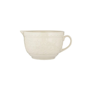 Mason Cash In the Meadow batter bowl in cream, side view showing embossed floral design and handle
