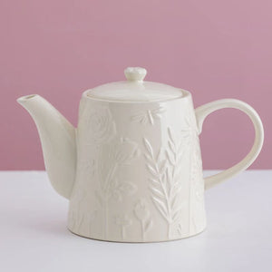 Mason Cash In The Meadow Cream Teapot on a pink background
