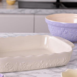 Mason Cash In The Meadow Large Rectangular Oven Dish shown close up on a marble benchtop.