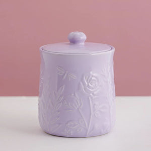 Mason Cash In The Meadow Storage Jar in Lilac on a pink background