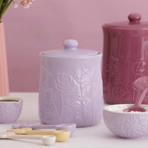 Set of Mason Cash In The Meadow Storage Jars on a light pink background
