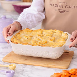 Mason Cash In The Meadow Medium Rectangular Oven Dish filled with pie.
