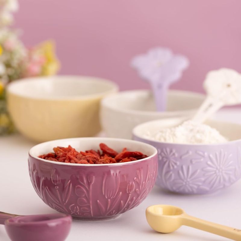 Set of four Mason Cash In the Meadow prep bowls in cream, lilac, yellow, and pink