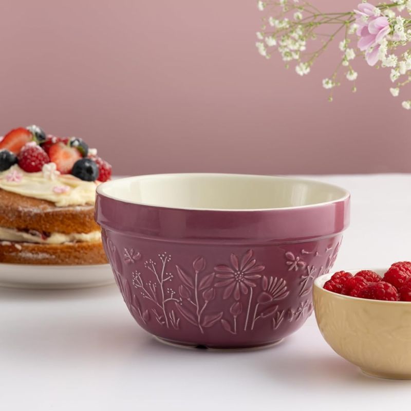 Mason Cash In the Meadow pudding basin in purple, side view showing embossed floral design