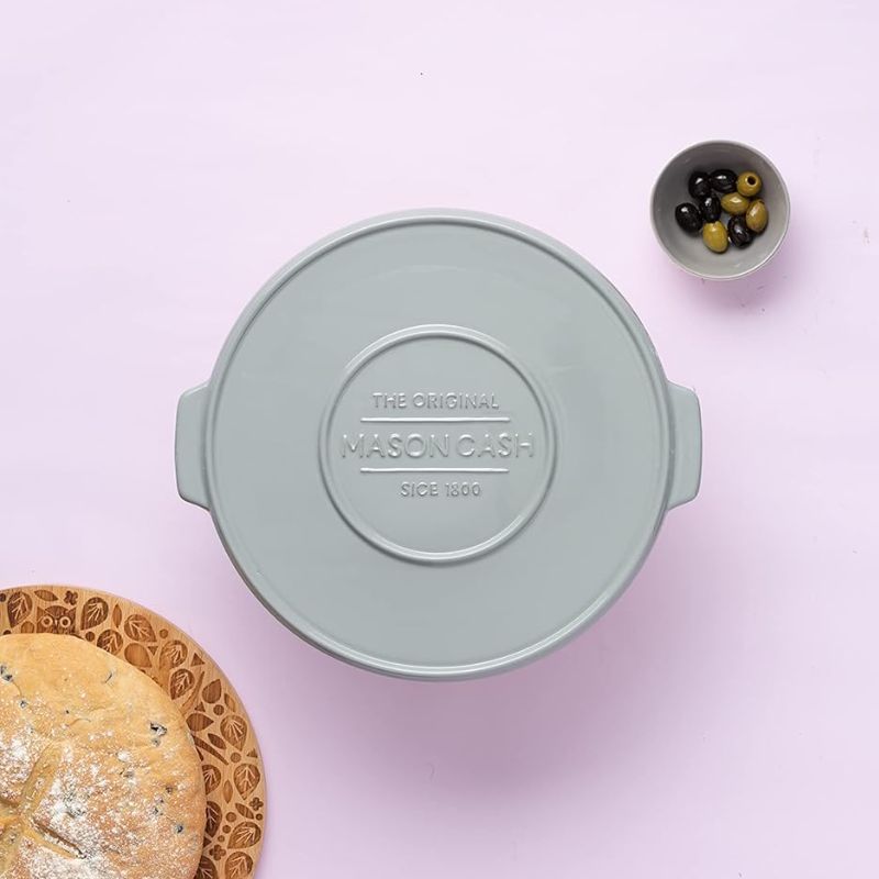 Front view of Mason Cash Innovative Kitchen terracotta baking stone with label