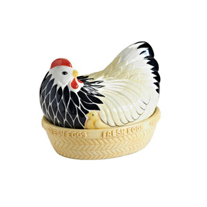 Mason Cash Mother Hen Nest featuring a ceramic chicken sitting on a basket-style base - used for storing eggs.