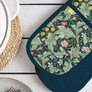 Close up view of the Museums & Galleries  Leicester Wallpaper double oven glove with green floral print.