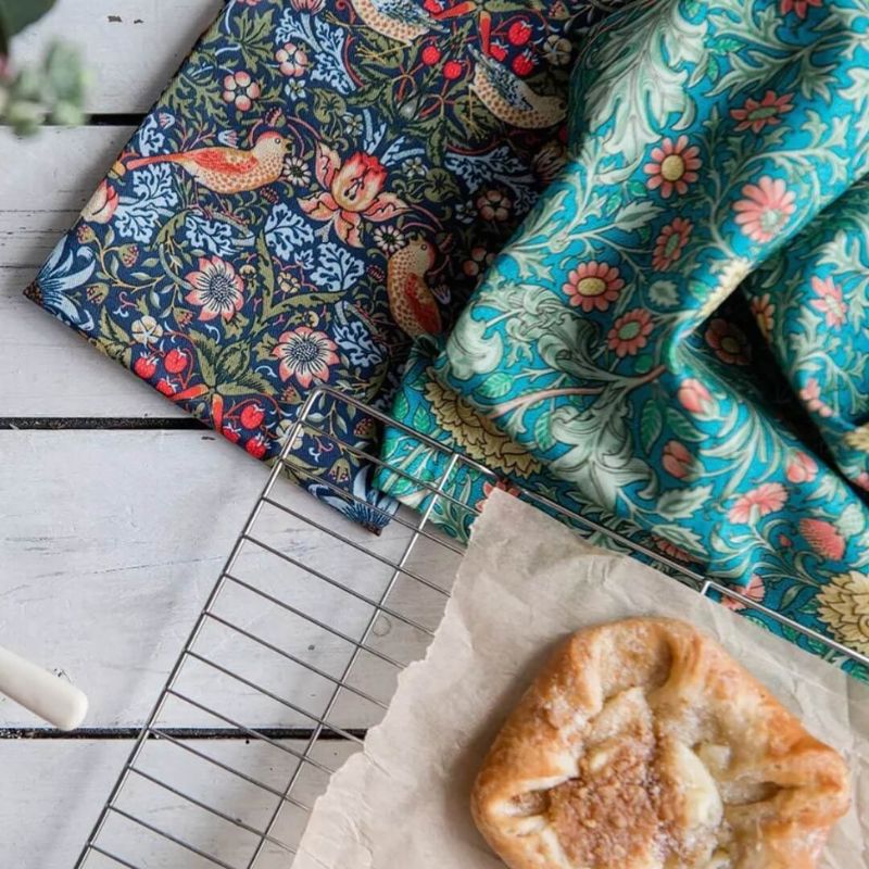 Museums & Galleries V&A Morris Designs tea towels in retail packaging.
