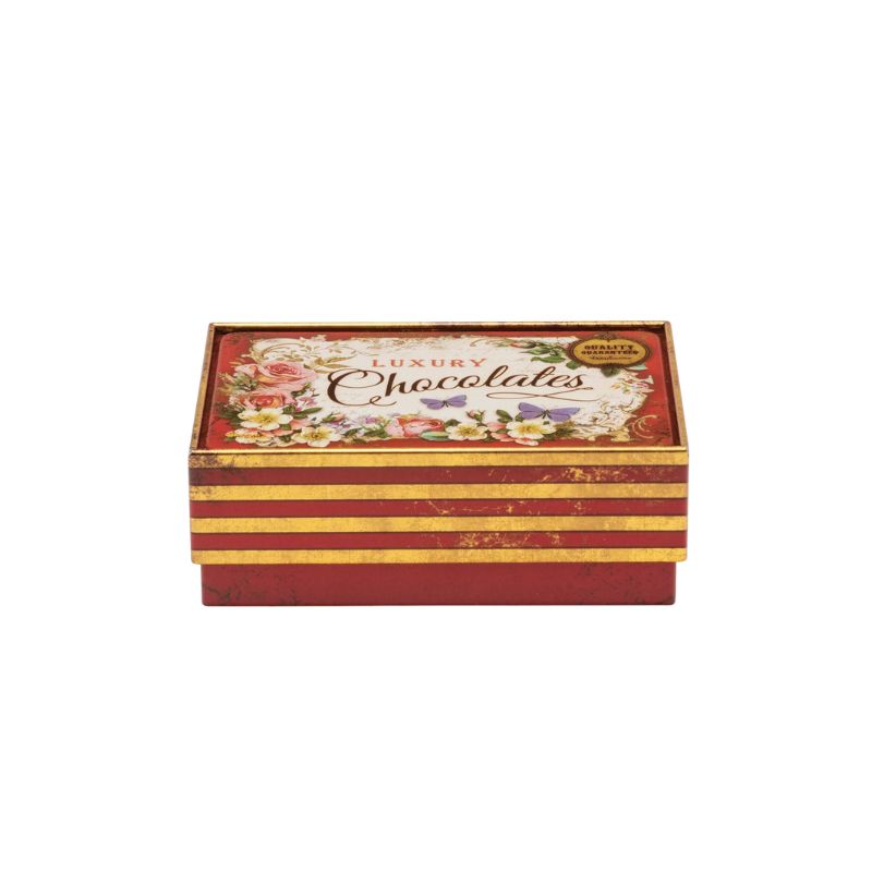 Decorative chocolate box with floral design and 'Luxury Chocolates' text on a white background - Nostalgia Small Chocolate Tin in red.