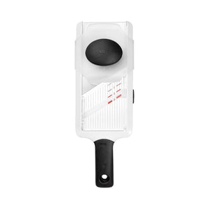 Top-down view of the OXO Good Grips Hand Held Mandoline Slicer showing blade settings and black safety guard.