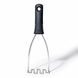 OXO Good Grips Wire Potato Masher with black handle on a white background