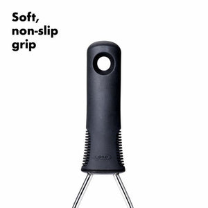 Close up of the OXO Good Grips Wire Potato Masher handle on a white background.