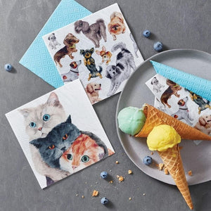 PAW Better Together Paper Napkins styled next to ice cream, blueberries, and dog themed napkins.