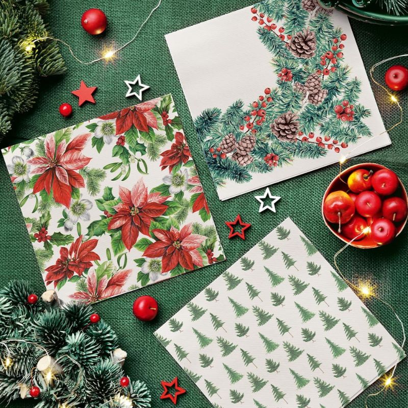 PAW Paper Napkins in the Glory Poinsettia pattern shown flat against a white background.