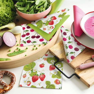PAW Strawberries with Bees Paper Napkins styled with cherry napkins and vegetables.