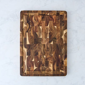 Peer Sorensen End Grain Cutting Board with Juice Groove on a white marble surface