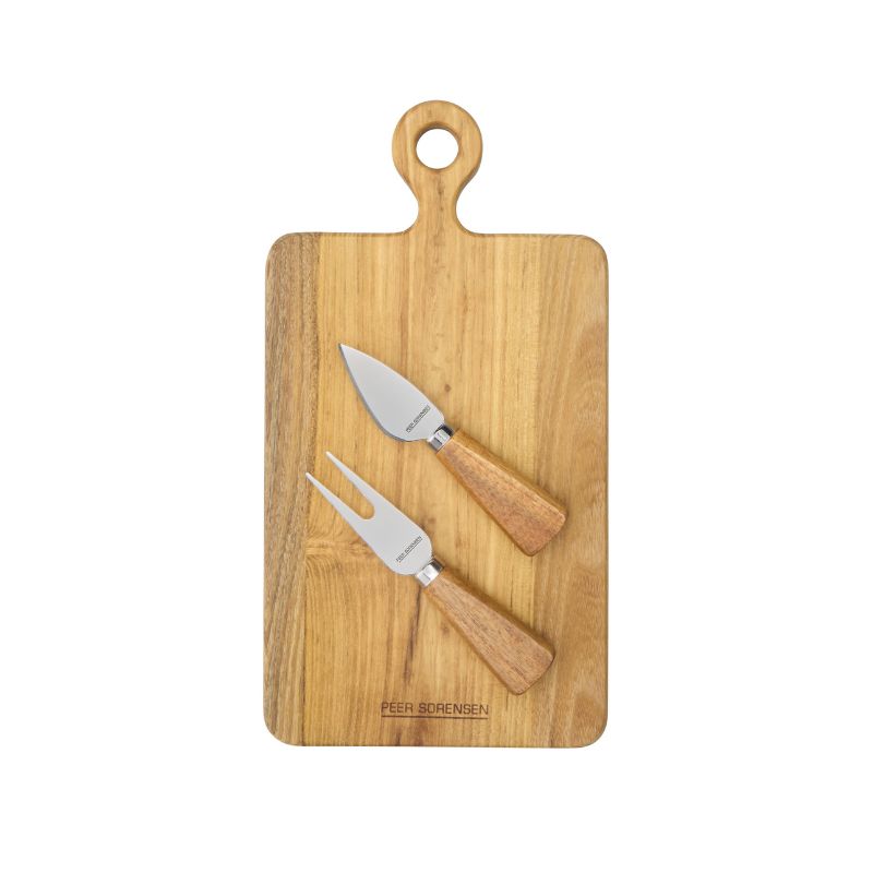 Rectangular teak paddle serving board with two stainless steel cheese knives featuring wooden handles arranged on top.