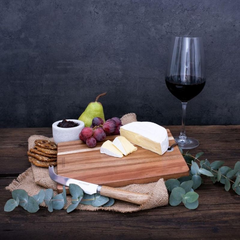 Peer Sorensen rectangular acacia cheese and serving board with serrated cheese knife, 20.5 cm stainless steel blade and wooden handle.