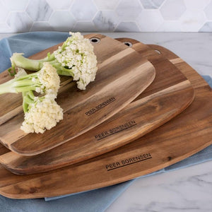 Peer Sorensen Slim Line Rounded Cutting Boards with cauliflower on a marble surface