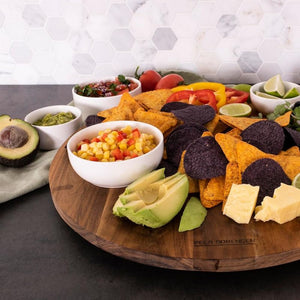 Peer Sorensen Lazy Susan set with bowls of salsa, guacamole, cheese, and tortilla chips