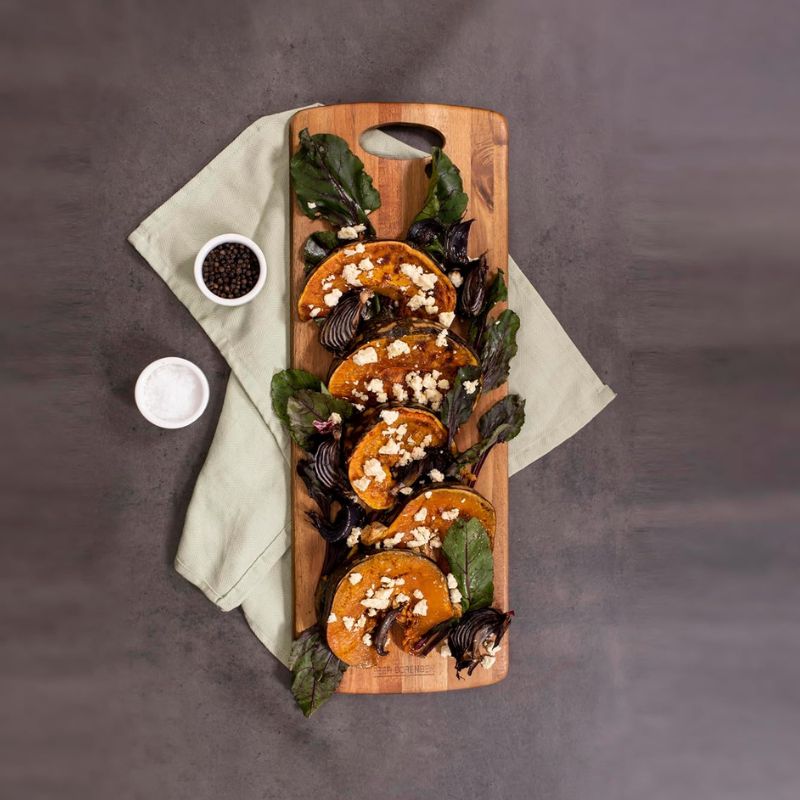 Peer Sorensen Tapas Serving Board styled with roasted pumpkin and garnishes.