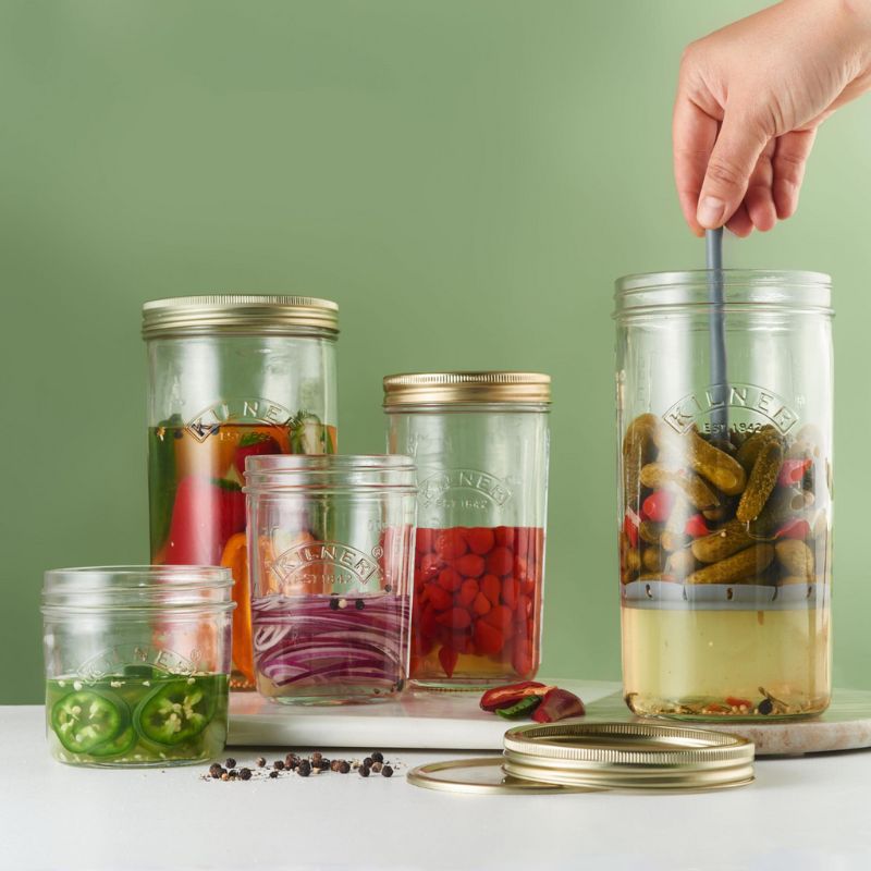Kilner Pickle Jar with Lifter with two-piece lid and removable lifter shown beside the jar.