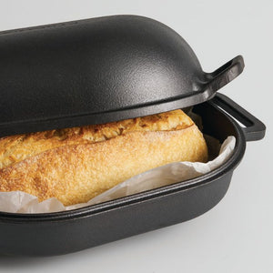 Pyrolux Pyrocast Bake & Roast Set with a loaf of bread inside on a light gray background