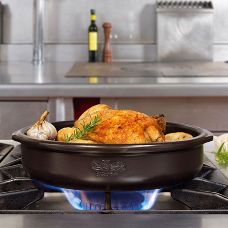 Roast chicken in a Regas Spanish Terracotta Black Professional Cazuela Baking Dish.