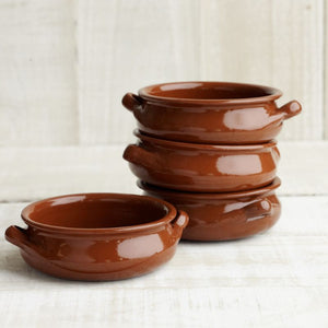 Stack of 13cm Regas Spanish Terracotta Round Casserole.