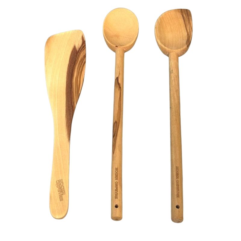 Olive wood cooking spoon with Roger Orfèvre branding on handle.