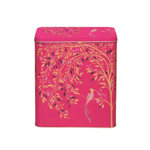 Sara Miller Chelsea Larder Tin decorated with a botanical design of gold branches, pink leaves, and a small bird on a white background.