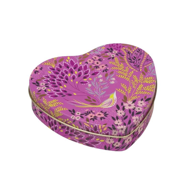 Sara Miller Mauve Songbird Small Heart Tin featuring purple, yellow, and pink botanical designs and a small bird motif, set against a plain white background.