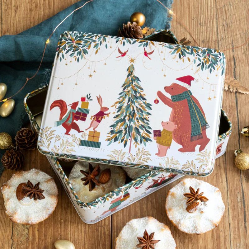 Sara Miller Woodland Tales Biscuit Tin filled with Christmas fruit mince pies and surrounded by Christmas decorations.