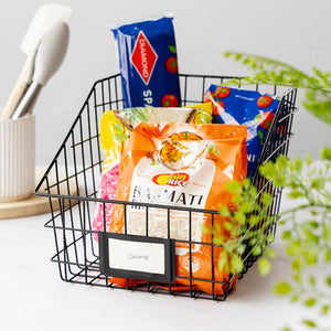 Seymours medium black wire basket storing rice and pasta packets for pantry organisation