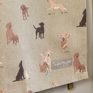 Close up of the playful dog print on the Sophie Allport Labradors & Retrievers Cotton Tea Towel.