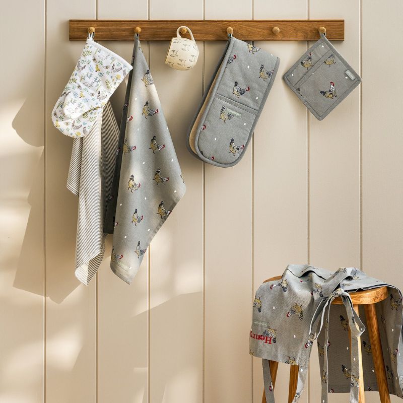 Sophie Allport Lay A Little Egg set of two tea towels displayed on a white background.