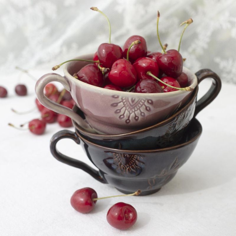 Sthal Arabesque Cup with Handle in Fig colourway – an earthy brown mug with floral detail shown against a white background.
