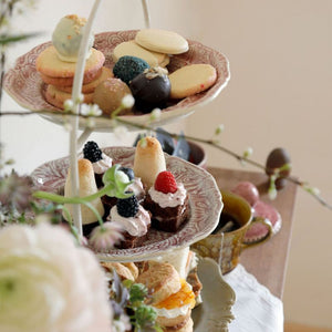 Sthal Arabesque Old Rose plates being used in a cake stand with an assortment of sweet treats.